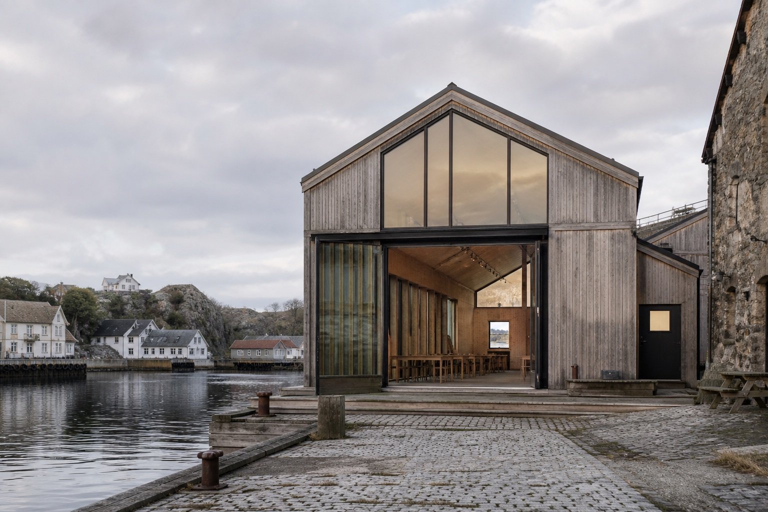 Provisorisk arkitekturbilde av en transformert bygning ved en havn